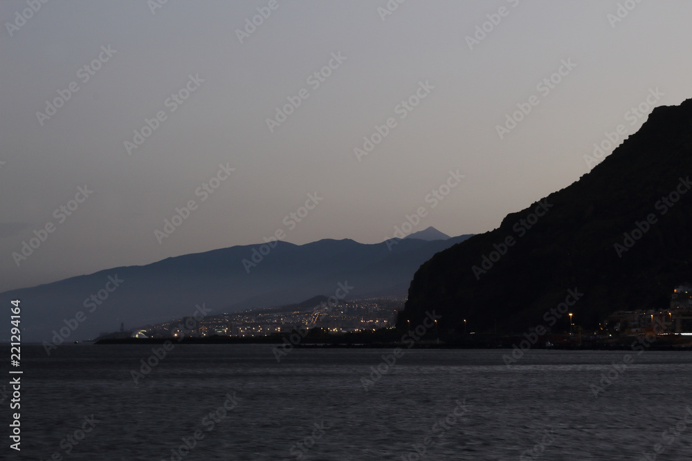 A San Andres and Santa Cruz landscape from Las Teresitas beach in the Tenerife island at the sunset