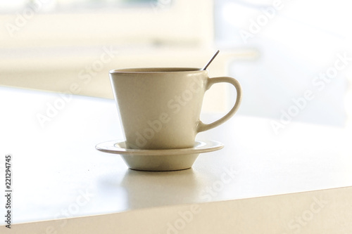 Cup of coffee or tea on a table