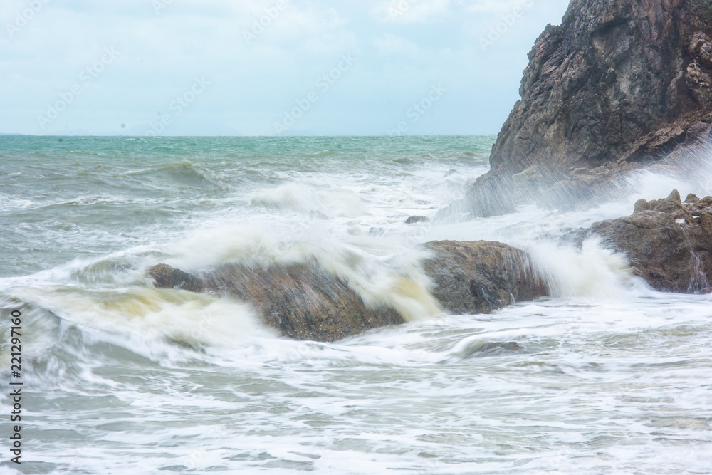 sea waves hit the rocks