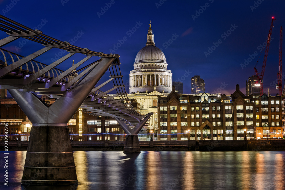 St Pauls Cathedral and the Millennium Bridge in London, England at night