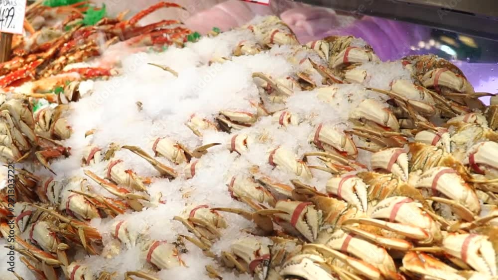 Fresh crabs lie on ice on the market Fresh crabs lie on ice on the market