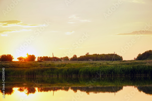 Beautiful summer sunset on a small lake