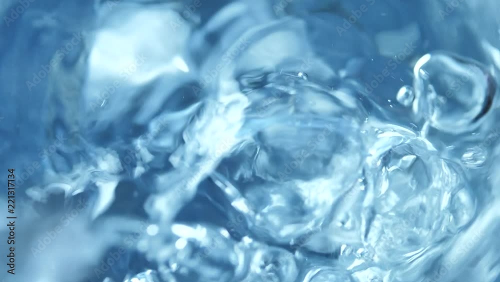 Close up of an Ice Cube with water Close up of an Ice Cube with water