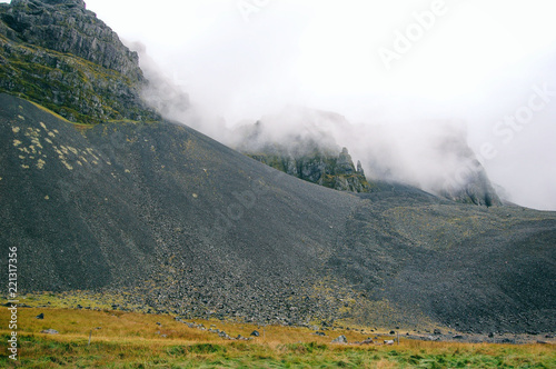 Volcanic mountains in a fog