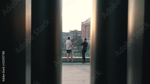 Wallpaper Mural Men in sports clothes after jogging in the city. Torontodigital.ca