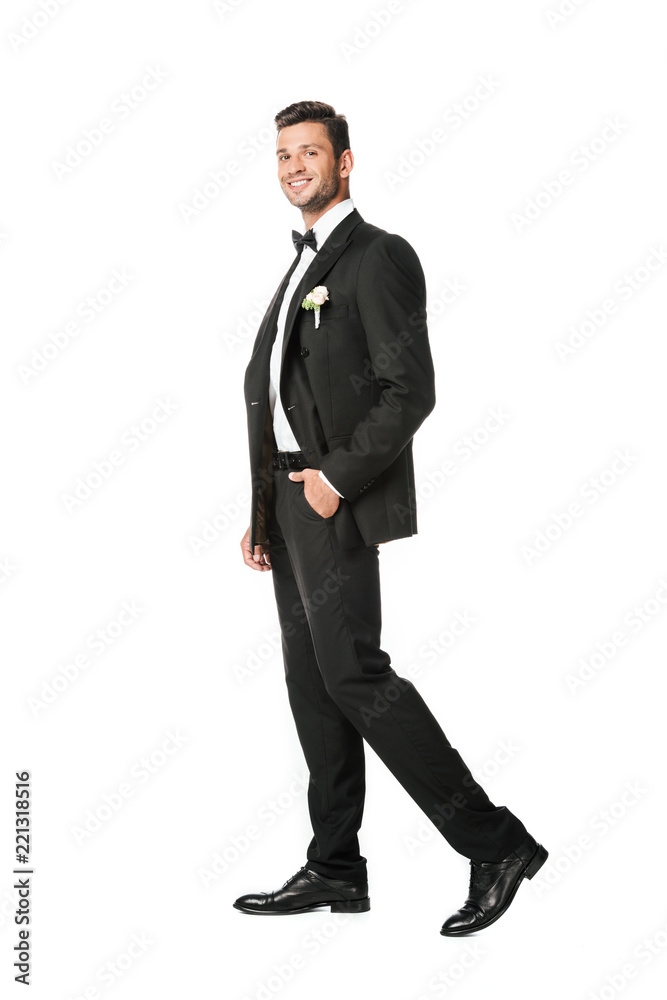 Obraz premium handsome young groom in stylish suit isolated on white