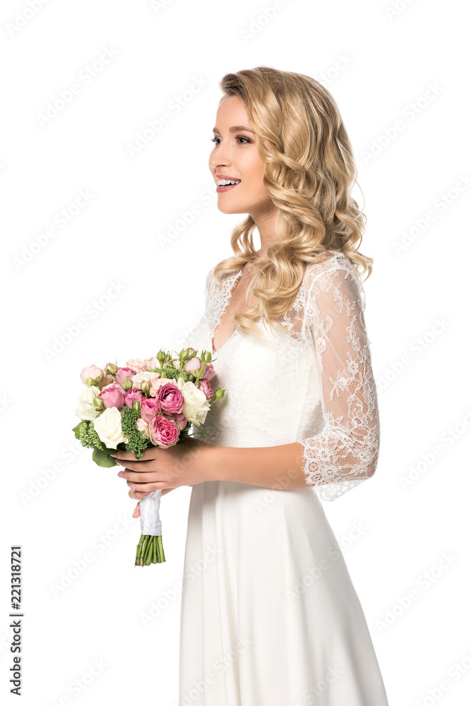 happy bride holding bouquet and looking away isolated on white happy bride holding bouquet and looking away isolated on white