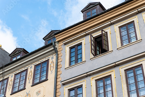 Warsaw / Poland - August 20 of 2018 : Street with colorful houses in Warsaw city. European architecture of old town in Poland. Concept of travel and city landscape.