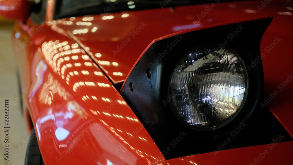 red Japanese vintage car at night