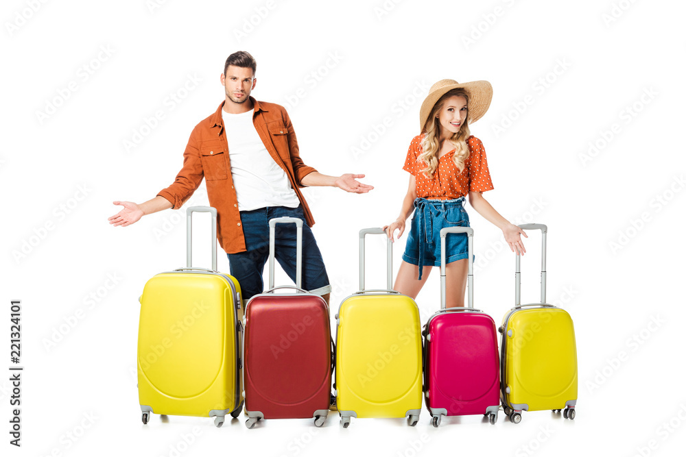 newlywed couple with arranged suitcases around isolated on white newlywed couple with arranged suitcases around isolated on white