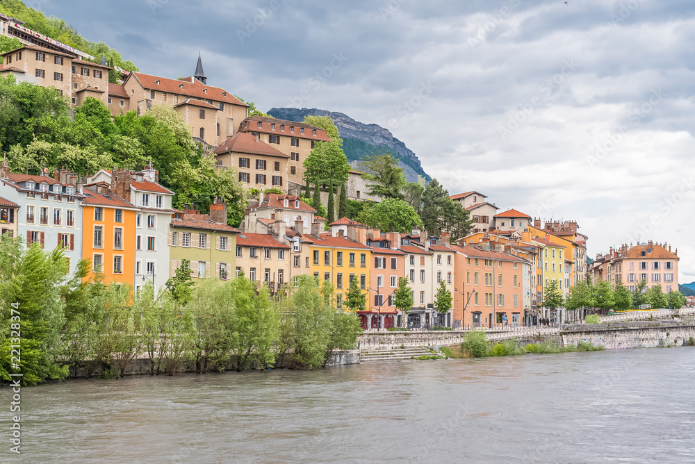 Grenoble, beautiful typical houses on the river Isere, in the old town
