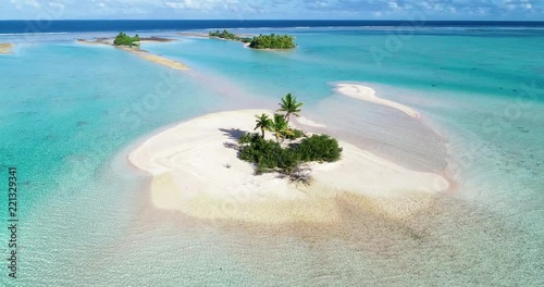 small desert island in aerial view photo