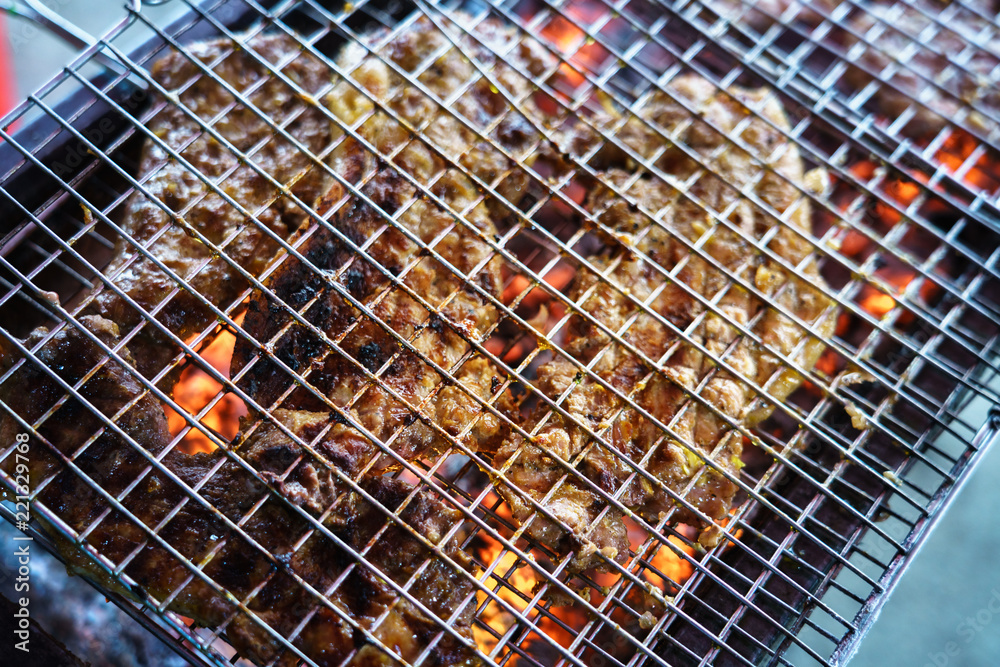Meat on the grill with flame. Outdoor bbq