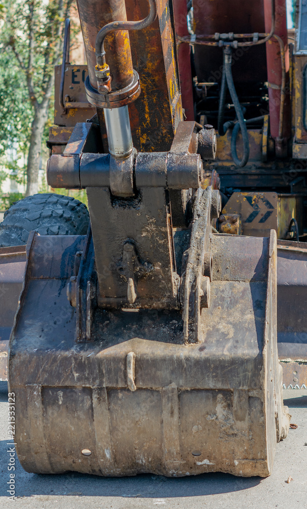 bucket old excavator on the street day bucket old excavator on the street day