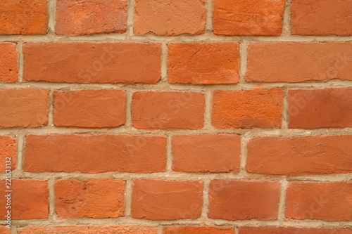 The image of a brick wall as a background. 8