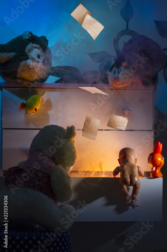 Playful room of fantasies where toys observe light and smoke coming out of the children's wardrobe, illustration of montages with images