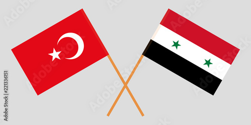 Crossed Syrian Arab Republic and Turkey flags. Official colors. Correct proportion. Vector