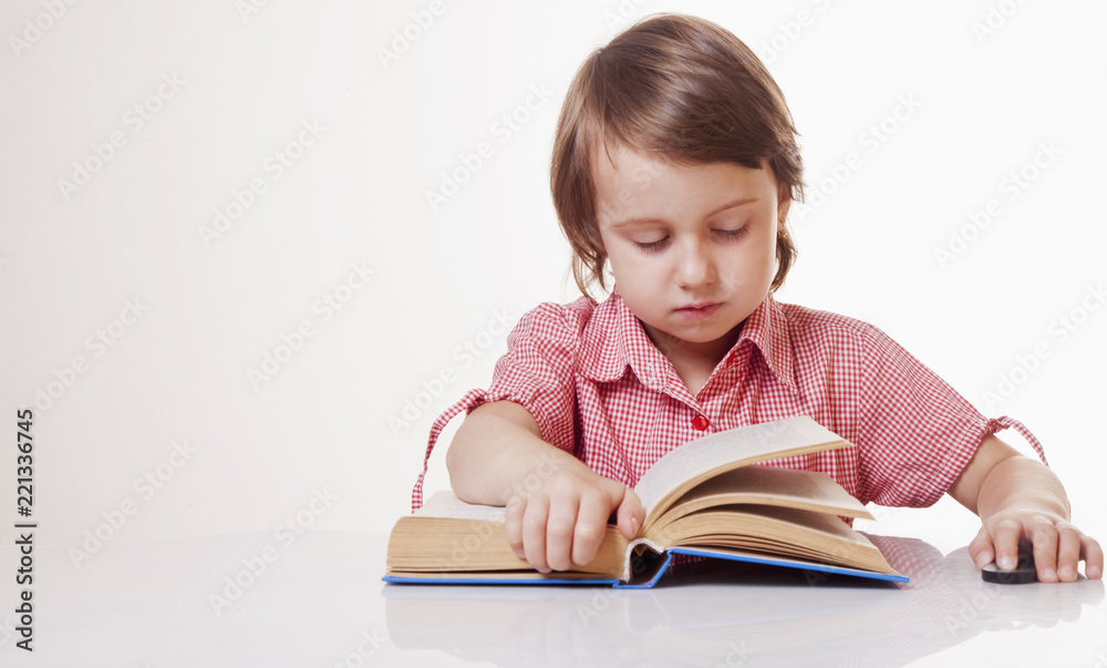 beautiful little child girl learns to read (education, childhood, development concept) beautiful little child girl learns to read (education, childhood, development concept)