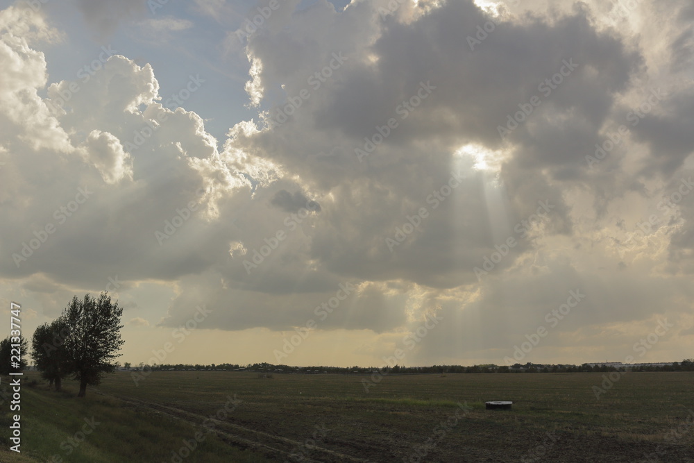 Fototapeta premium behind the clouds the sun