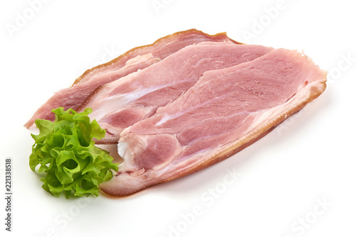 Sliced Italian prosciutto crudo or jamon. Smoked Pork ham, isolated on white background.