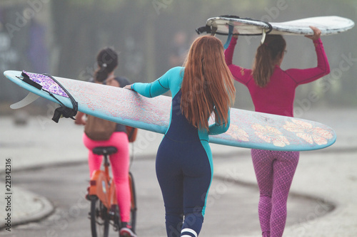 women with surfboards 
