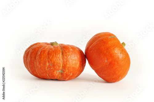 Isolated photo of pumpkin. Orange pumpkin on the white background. use for postcards, wallpapers, textiles, scrapbooking, decoration, invitations, background, holiday.