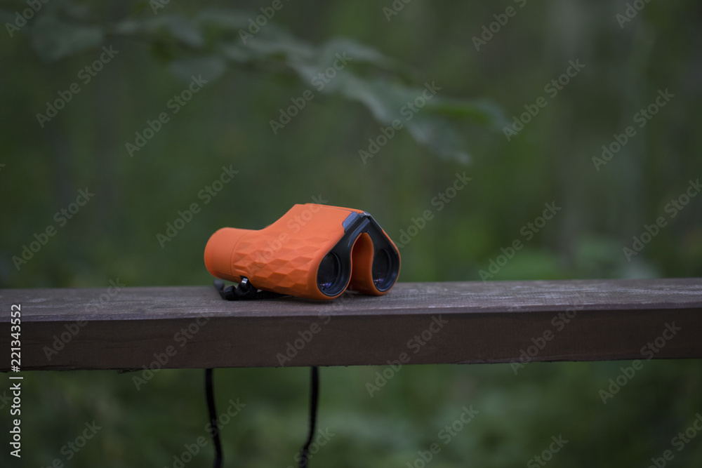 Orange binoculars