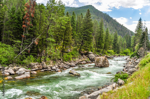 The Waters of the Gallatin River Flow Down From the Mountains of Montana photo