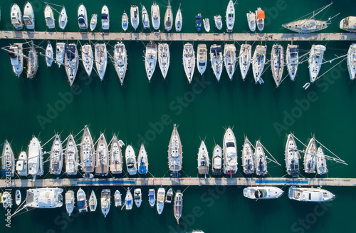 Yacht parking, A marina lot, yachts and sailboats are moored at the quay.