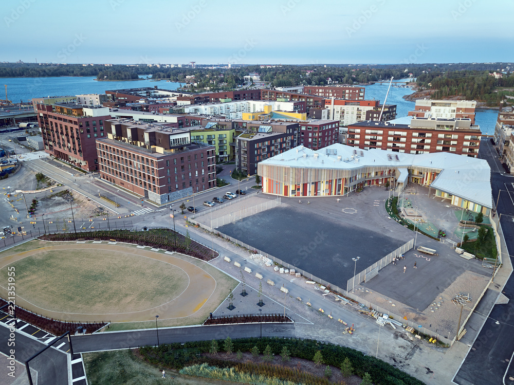 Obraz premium Aerial view of new district Kalasatama, modern school and kindergarten