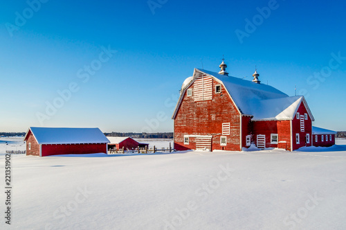 Minnesota Small Farm Perched on a Snowy Hill