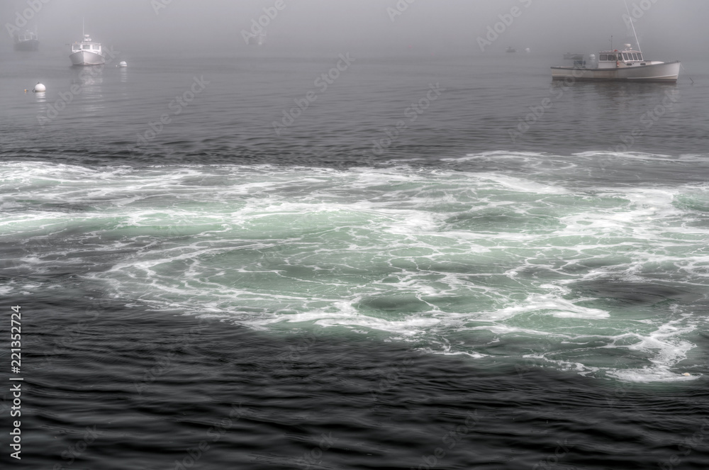Moored Boats and Churned Up Water
