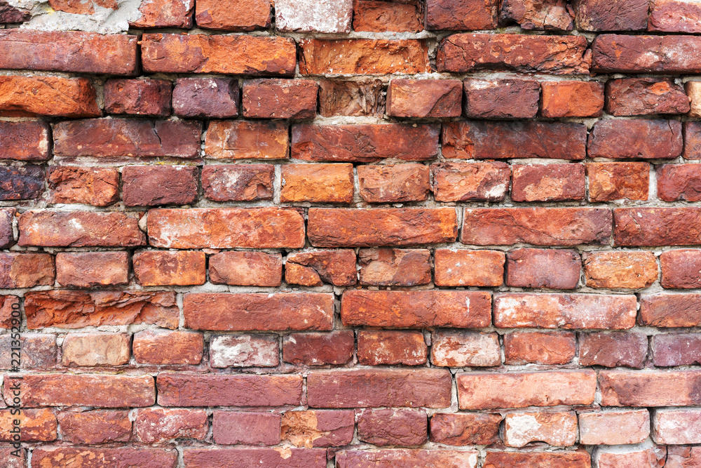 Old brick wall, old texture of red stone blocks closeup Old brick wall, old texture of red stone blocks closeup