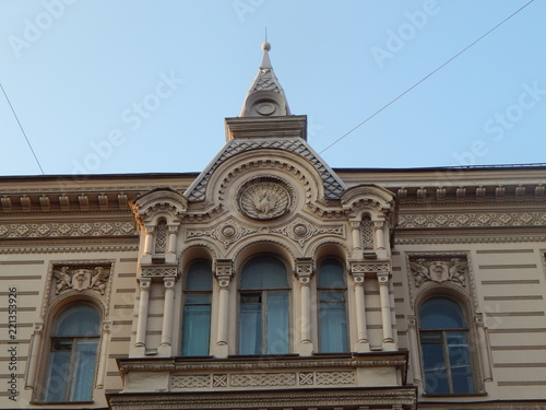 Fragment of the facade of the beautiful old house Muruzi in St. Petersburg  decorated with arches and oriental ornament