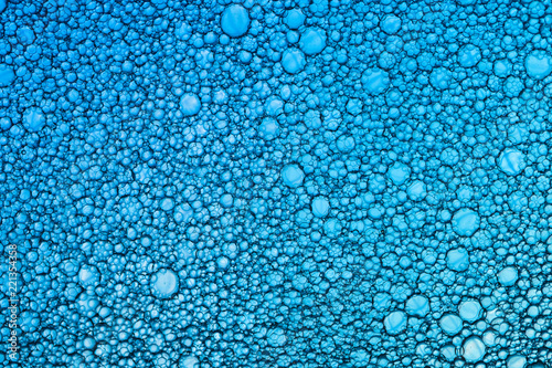 Background of oil droplets on the water surface.