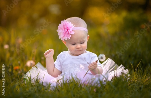 Portrait of small baby girl in ballerina dress