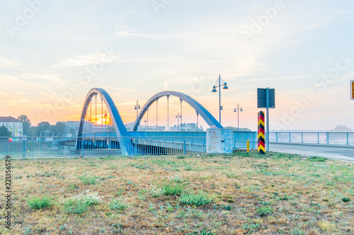 View of border bridge between Poland and Germany. Sunrise view of bridge from Frankfurt Oder in German.