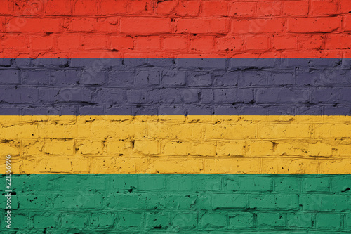 Texture of a flag of Mauritius on a brick wall.