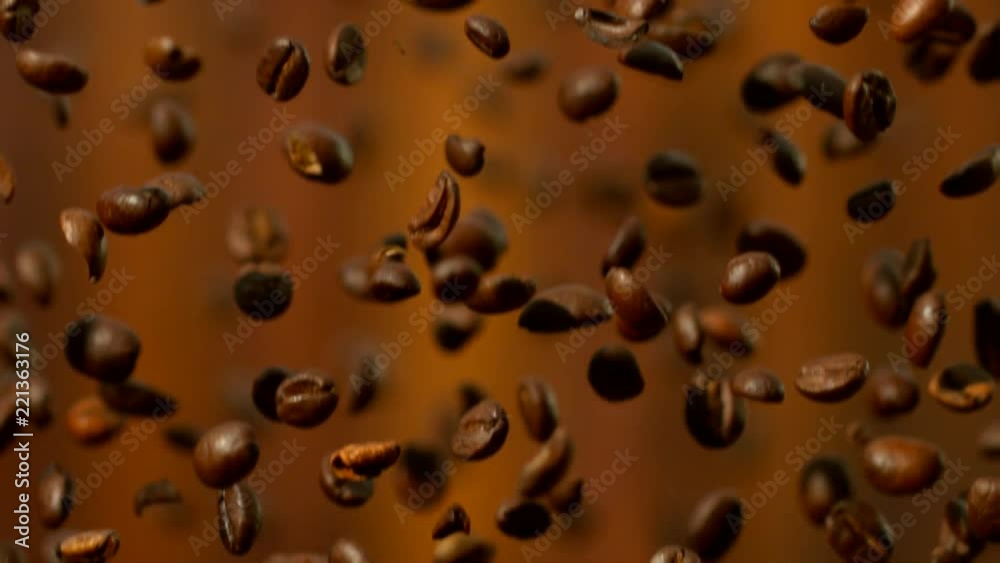 Super slow motion of falling coffee beans. Filmed on high speed cinema camera, 1000 fps. Super slow motion of falling coffee beans. Filmed on high speed cinema camera, 1000 fps.