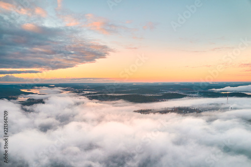 Aerial view of a coast of Ladoga Lake over the fog