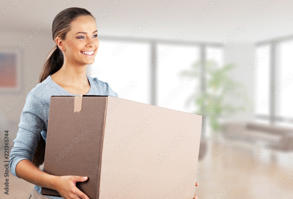 Attractive young woman with box, delivery concept Attractive young woman with box, delivery concept
