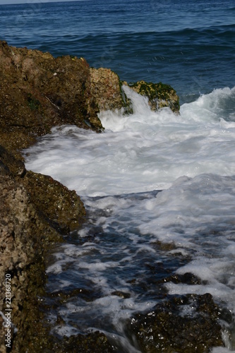 waves crashing on rocks