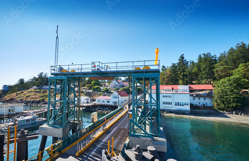 Slika na platnu Orcas Island ferry terminal with car loading ramp on a sunny summer afternoon