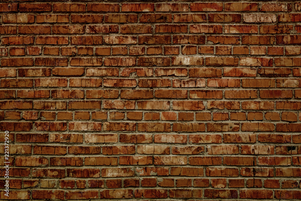 Naklejka premium Brick wall. Brown brick wall. Brick background. Grunge brick wall.