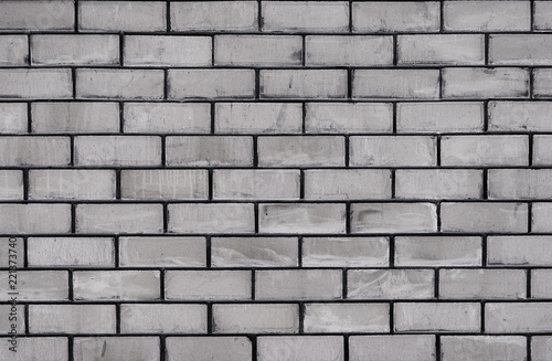 New brick wall. New brickwork. Gray brick wall. Brick background.