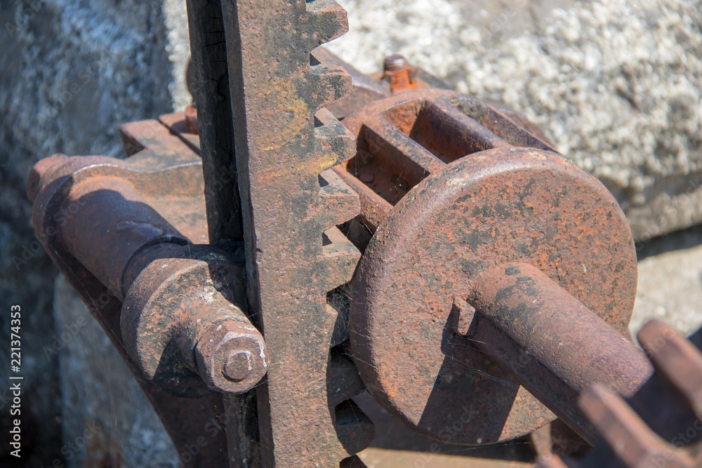 Rusty gear closeup, summer sunshine, no body. Rusty gear closeup, summer sunshine, no body.