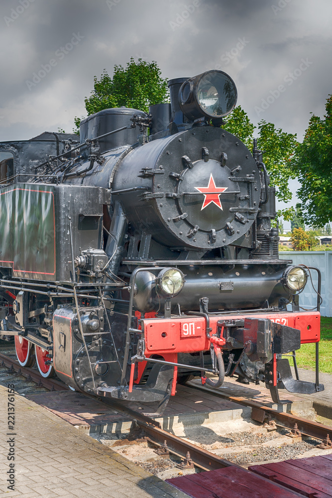 Front view of an old-fashioned steam locomotive