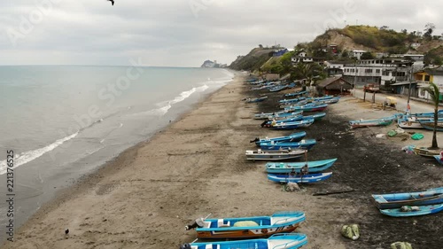 Flying over fishing boats on the beach at Tonchigue, a village on the Pacific coast of Ecuador, Esmeraldas province photo