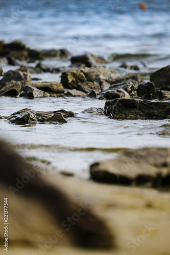 Stones and waves close up