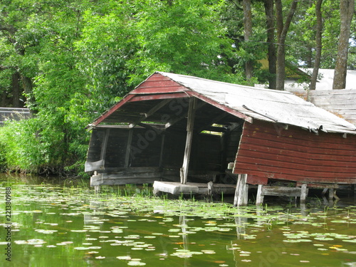 Old boat house on the river